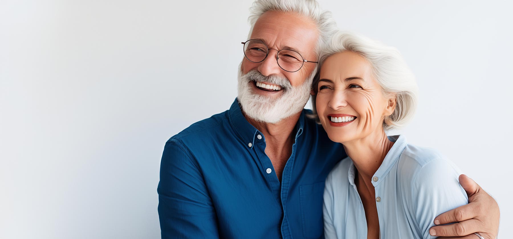 Smiling couple with Dentures